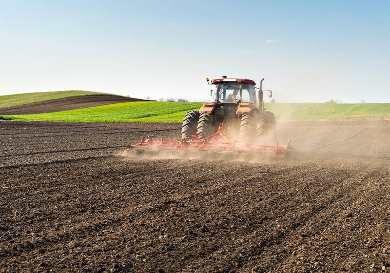 tractor preparing land