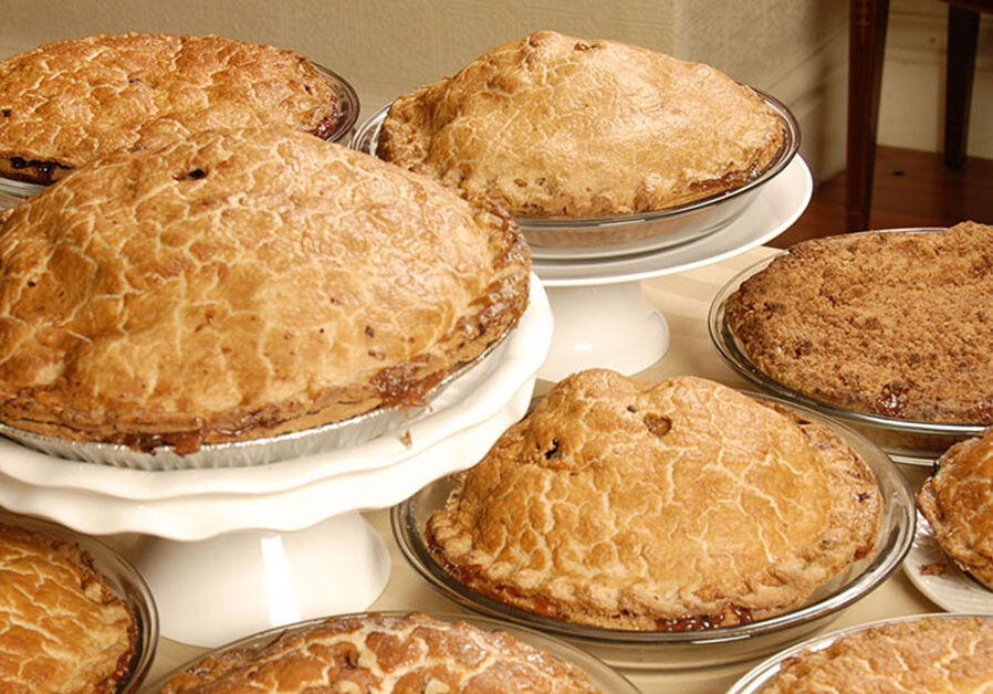 table of apple pies